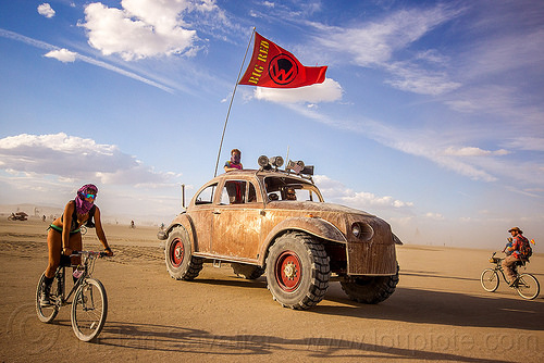 burning man - bigred - giant vw beetle art car, beetle art car, bicycle, bigred art car, burning man art cars, mutant vehicles, red flag, volkswagen, vw beetle