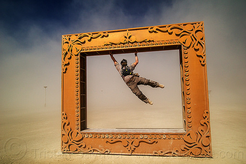 burning man - blm officer swinging in giant frame, art installation, blm, cop, giant frame, got framed, hanging, law enforcement officer, leo, man, police, swinging