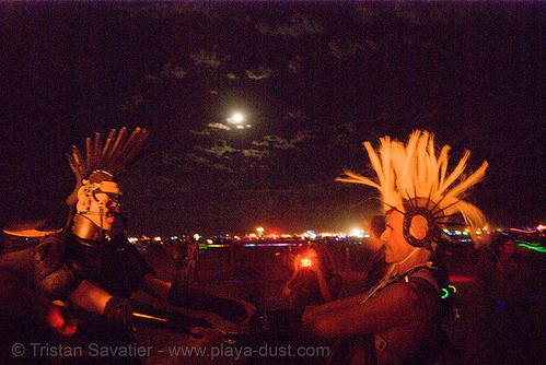 burning man - burners under the full moon, burning man at night, full moon, night of the burn