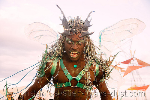 burning man - cat-eye contact lenses - vampire, african american man, black man, cat-eye contact lenses, color contact lenses, contacts, special effects contact lenses, teeth, theatrical contact lenses, vampire fangs