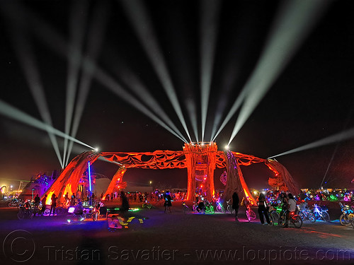 burning man - cathedral by root society, burning man at night, glowing, red, stage, white lasers