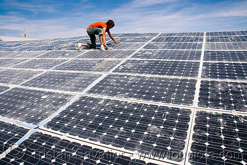 burning man - cleaning-up dust on the solar panels, electricity, nectar village, photovoltaic array, power, snow koan solar, solar array, solar energy, solar panels