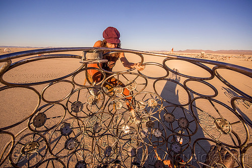 burning man - climbing brainchild cage, art installation, brainchild, cage, michael christian, rings, sculpture