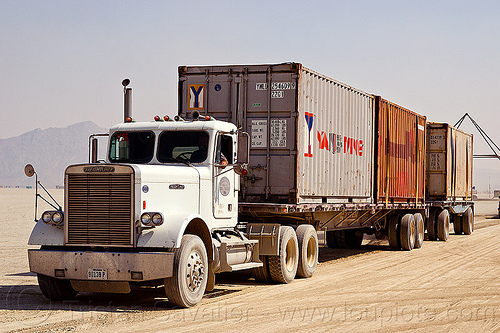 burning man - containers on semi truck, articulated lorry, containers, flat bed, semi trailer, semi truck, tractor-trailer, trucks