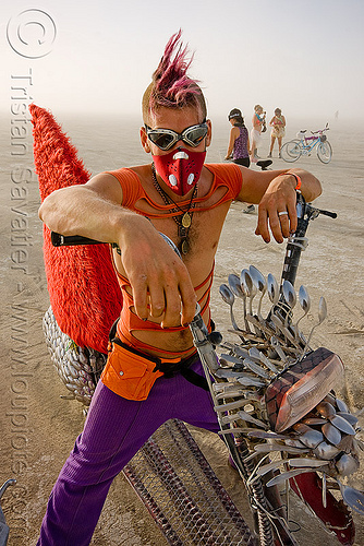 burning man - cool burner with mohawk and spoon fish bike - eric, art car, burning man art cars, dust mask, fish bike, goggles, mohawk hair, motorcycle, mutant vehicles, respirator, rider, riding, spoon bike, spoon scooter, spoons