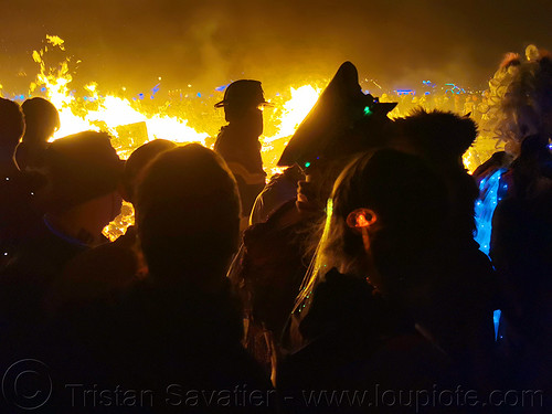 burning man - crowd running around the man's burn, burning man at night, night of the burn