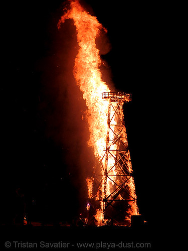 burning man - crude awakening, burning man at night, fire, oil derrick, sculpture, wood tower