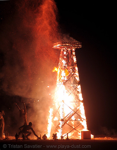 burning man - crude awakening, burning man at night, fire, oil derrick, sculpture, wood tower