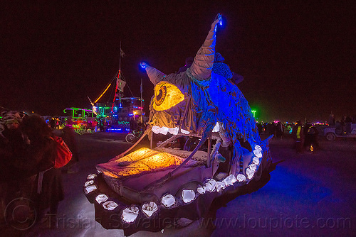 burning man - cyclops monster art car, burning man art cars, burning man at night, cyclops, eye, glowing, monster, mouth, mutant vehicles, teeth, unidentified art car