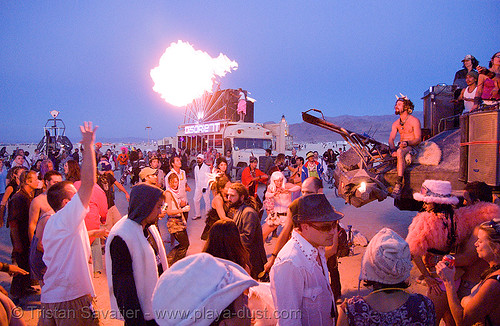 burning man - dancing near the temple at dawn, fire