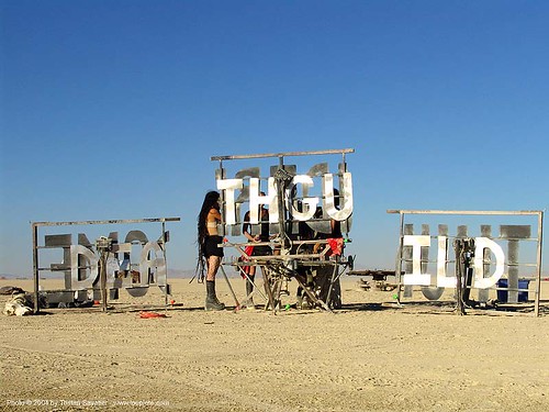 burning man - death-guild camp sign on the playa, dgtd