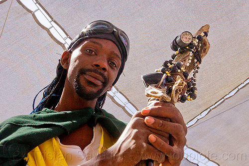 burning man - decorated staff, beads, cane, ceremonial staff, ceremonial stick, decorated, goggles, hands, man