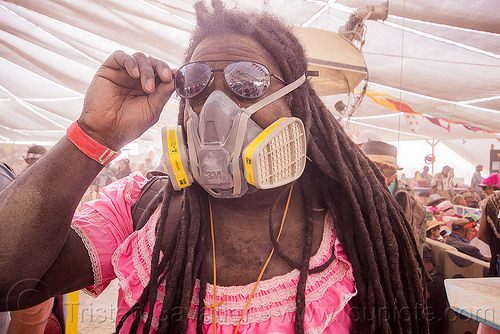 burning man - dreadlocks and dust mask, dreadlocks, dust mask, dust particulate mask, dusty, man, pink dress, sunglasses