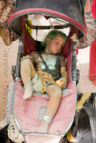 burning man - dusty kid in stroller - green hair, boy, child, dusty, kid, sitting, sleeping, stroller