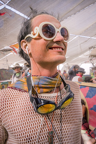 burning man - dusty man with white fishnet top at center camp, attire, burning man outfit, dusty, fishnet top, goggles, white