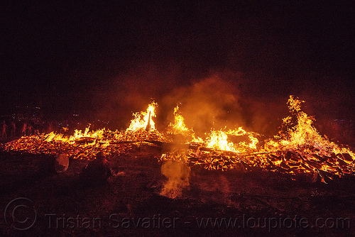 burning man - fire and embers after the man burned, burning man at night, fire, night of the burn