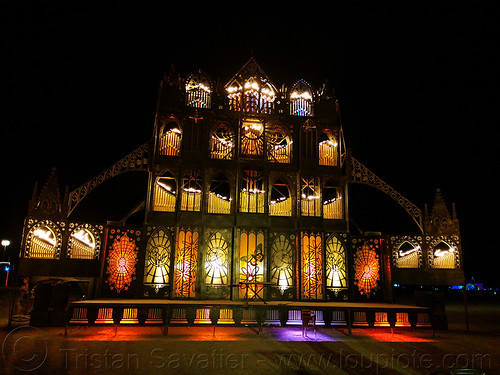 burning man - fire kethedral, art installation, burning man at night, fire kethedral, fire organ, glowing, reared in steel