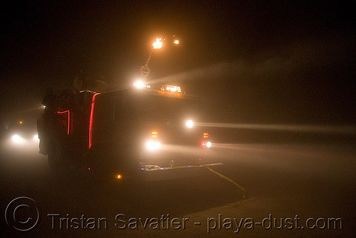 burning man - fire truck in the dust storm - sparky the fire truck, art car, black rock city fire, burning man art cars, burning man at night, dust storm, fire engine, fire truck, mutant vehicles, playa dust, whiteout