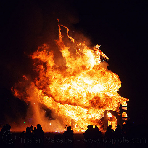 burning man - fire twisters over huge fire - the man is burning, backlight, burning man at night, fire twisters, firenado, night of the burn, silhouettes, the man