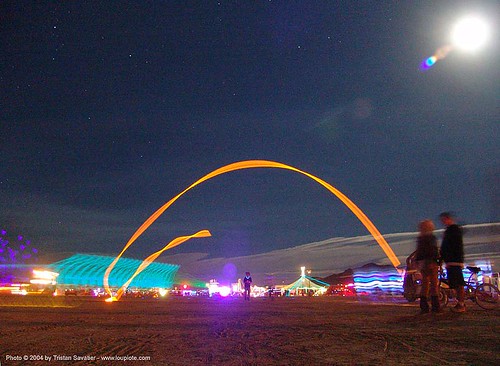 burning man - flying glowstick, burning man at night, glowing, glowstick