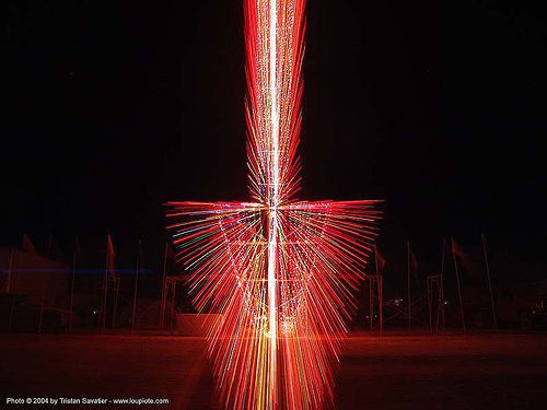burning man - giant arrow, art installation, burning man at night