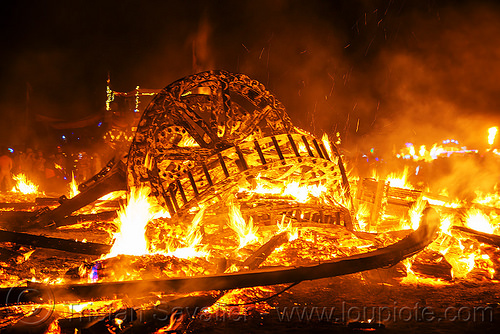 burning man - giant gears in the man fire embers, burning man at night, fire, night of the burn, the man