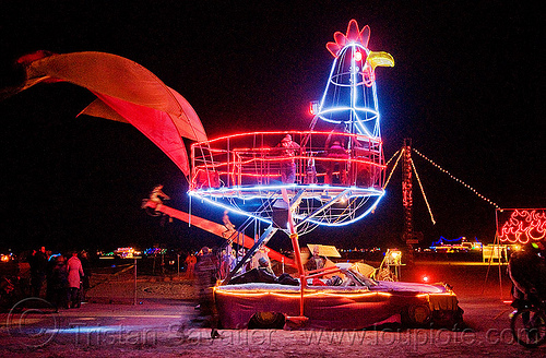 burning man - giant rooster art car by loki, art car, burning man art cars, burning man at night, chicken car, loki, mutant vehicles, rooster