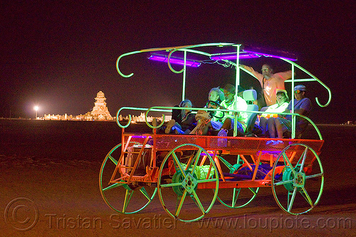 burning man - glowing art car, burning man art cars, burning man at night, glowing, mutant vehicles, unidentified art car, wagon