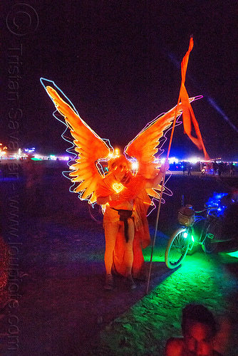 burning man - glowing el-wire angel costume, angel costume, angel wings, attire, burning man at night, burning man outfit, el-wire, flag, glowing, orange