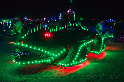 burning man - green lizard art car, burning man art cars, burning man at night, copper, glowing, lizard, mutant vehicles, red, unidentified art car