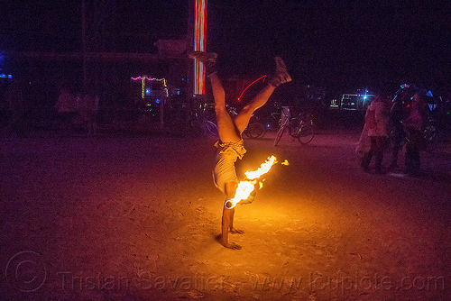 burning man - handstand with fire staff, burning man at night, fire dancer, fire dancing, fire performer, fire spinning, fire staff, handstand, woman