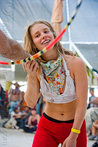 burning man - hula hooper at the center camp cafe - ashley, arm, ashley, attire, burning man outfit, hoop passing, hula hoop, hula hooper, hula hooping, passing hoop, woman