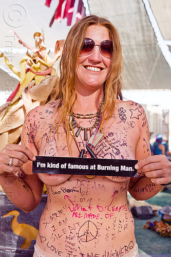 burning man - human graffiti wall woman is famous, body graffiti, bumper sticker, famous people, graffiti wall, necklaces, skin graffiti, woman