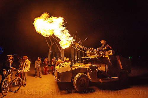 burning man - humvee art car shooting fire, burning man art cars, burning man at night, fire cannon, hmmwv, humvee, mutant vehicles, unidentified art car