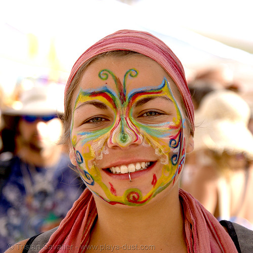 burning man - italian burner with face paint, face painting, facepaint, makeup, painted, rainbow colors, woman