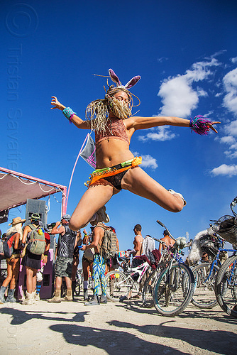 burning man - jumping bunny girl - olivia, bicycles, braided hair, braids, bunny ears, jump shot, woman