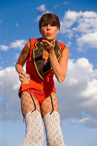 burning man - kelley on stilts, attire, blow a kiss, blowing a kiss, burning man outfit, circus metropolus, costume, kelley, stilts performer, stiltwalker, stiltwalking, woman