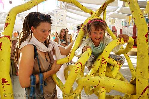 burning man - kid playing in yellow maze, child, denise, kid, playing, woman, yellow pipes