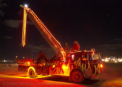 burning man - ladder firetruck, art car, burning man art cars, burning man at night, fire engine, fire truck ladder, glowing, ladder fire truck, ladder truck, mutant vehicles