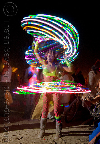 burning man - led hoops - michele, burning man at night, glowing, hooper, hula hoop, hulahoops, led hoop, led lights, light hoop, woman