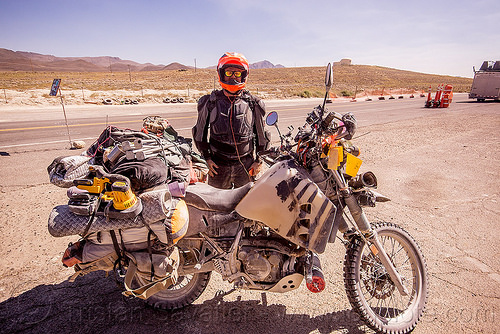 burning man - loaded klr 650 motorcycle, bags, dual-sport, dust, dusty, helmet, ims tank, kawasaki, klr 650, luggage, man, motorcycle touring, overloaded, rider, road