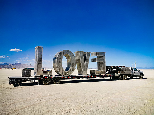 burning man - love sculpture - giant letters, big words, large words, letters, love, metal sculpture, trailer, truck, word