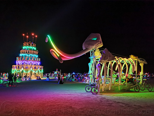 burning man - ma'am the mammoth art car, birthday cake, burning man art cars, burning man at night, glowing, ma'am the mammoth art car, megacake, mutant vehicles