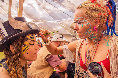 burning man - mary-claude getting a face paint, face paint, face painting, hat, mary-claude, women