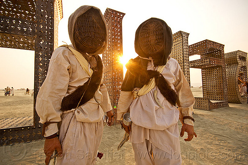 burning man - masked warriors at believe giant letters, art installation, attire, believe, big words, burning man outfit, costume, letters, metal sculpture