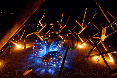 burning man - ménage à trois, art installation, burning man at night, giant eggs, glowing, led lights, menage a trois, mosaic, ménage à trois, rob buchholz