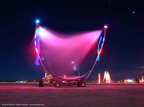 burning man - mobile art, art installation, burning man at night, glowing