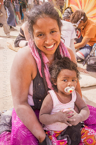 burning man - mother and young daughter, child, daughter, dusty, kid, lila, little girl, mother, pacifier, sitting, toddler, woman