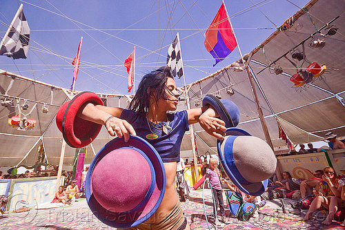 burning man - mumu juggling with hats, bowler hats, circus performance, hat juggling