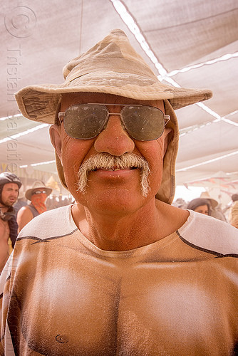 burning man - mustachioed man at center camp, dusty, hat, man, mustache, sunglasses